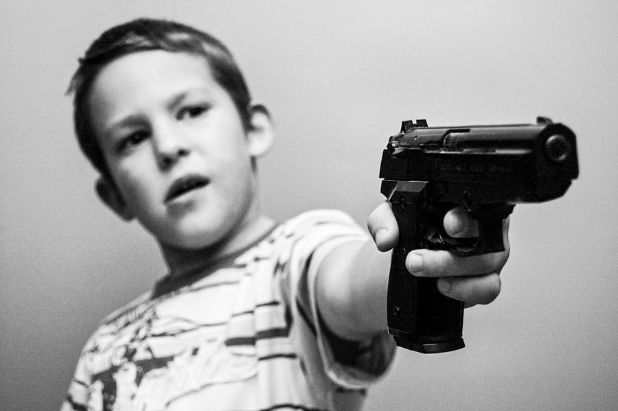 Image result for kid with a gun