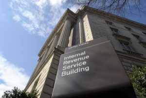 The exterior of the Internal Revenue Service building in Washington, Friday, March 22, 2013. Taxes are at the center of every major budget fight gripping Washington. Democrats and Republicans simply do not agree on whether taxpayers should be asked to shell out more in order to reduce government borrowing. Thatís why Congress and the White House couldnít agree on a plan to avoid automatic spending cuts. (AP Photo/Susan Walsh)
